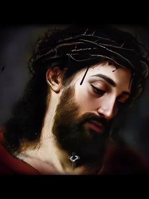 The image is a close-up portrait of a man with long hair, a beard, and a crown of thorns on his head. A small cross pendant hangs around his neck. The man's gaze is downward, and his expression is one of solemnity or contemplation.