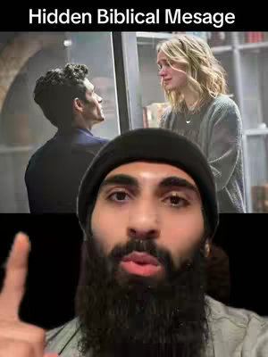The cover image is a split screen. The top portion shows a well-lit scene of two people indoors. A man and a woman looking at each other and the woman appears to be crying. The bottom portion features the creator in a black beanie, beard, and pointing upwards.