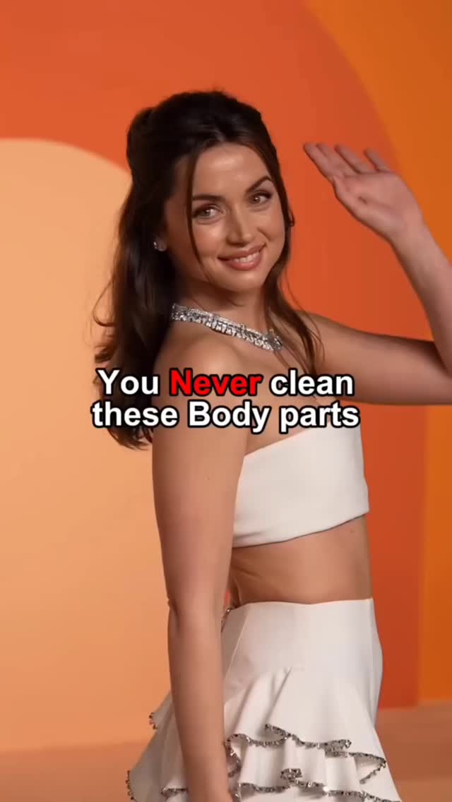 The cover image features a woman smiling and waving, set against an orange background.