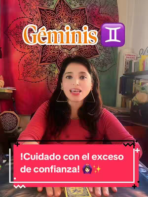 The cover image shows a woman in a red top with long dark hair, facing and speaking towards the camera. Above her is text in stylized fonts; a banner below contains additional text, plus small graphic elements. The background includes a tapestry and objects on a desk.