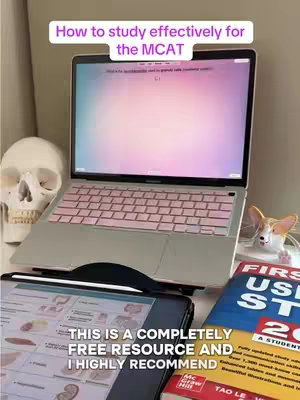 The image shows a laptop with a pink keyboard on a desk, with a skull, a book, and a tablet in front of it. Text overlays at the top and bottom provide context. The overall setting looks like a study or workspace.