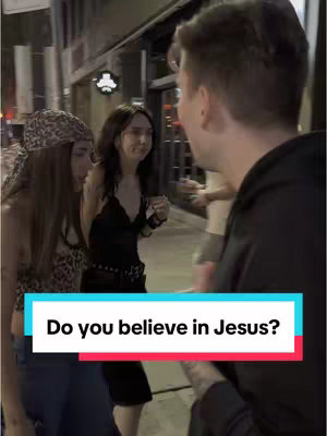 The cover image captures a street interview scene at night. In the foreground, a man wearing a black hoodie is turned toward the right, facing away from the camera. To the left, two women are in focus, with one wearing a leopard-print bandana and the other, in a black top, looking at the man. A text overlay at the bottom provides the question being asked. The background shows a city street, with building fronts and a streetlamp contributing to the nighttime ambiance.