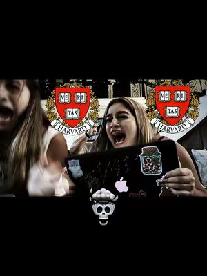 The cover image presents a dramatic scene of two young women reacting with open mouths and wide eyes. The focal point is on the two women, who are positioned closely together. Background elements are limited and indistinct, with the Harvard University crest prominent behind the two women. The image uses a contrasting color palette, and the overall composition accentuates the intensity of the reaction.