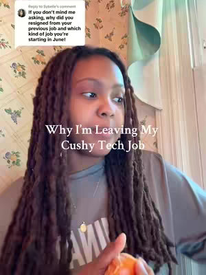 A woman with long dreadlocks is centered in the frame. Text overlays read "Why I'm Leaving My Cushy Tech Job." The background features floral wallpaper and a partial view of a window.