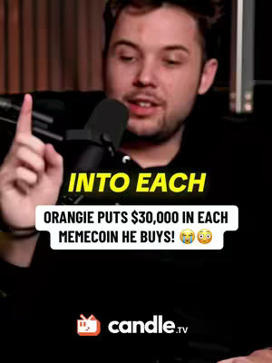 A man with fair skin is shown from the chest up, with the top of his head cut off. He's in a studio setting, likely a podcast or interview, with a microphone in front of him. Above him, the text 'INTO EACH' is displayed in a yellow font. Below, a white text box reads, 'ORANGIE PUTS $30,000 IN EACH MEMECOIN HE BUYS! 😭😳'. The Candie.tv logo is at the bottom.