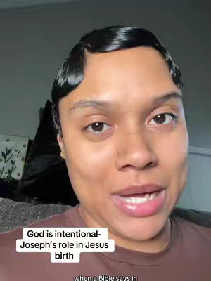 A close-up shot of a Black woman with dark hair styled with finger waves. She is looking at the camera and speaking. Overlayed text appears near the bottom.