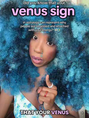 The cover image features a Black woman with large styled, blue-purple hair. Text overlays include the video's title. She is holding up her thumb, wearing rings and nose jewelry.