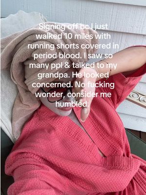 A person is wrapped in a pink robe and towel, holding their face in a position that hides the bottom half of their face. Text overlayed on the image indicates sadness and humiliation.