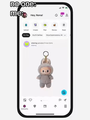 The cover image presents a smartphone screen displaying a social media app interface. The screen showcases a post with a Labubu doll keychain. Text overlays, including "no one: me:" at the top left and app control bars below, frame the content. The overall composition suggests a focus on the app and its features, while also incorporating a playful element with the Labubu doll.