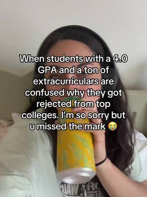 The cover image shows a young woman from the chest up, slightly angled towards the camera, in an indoor setting with a cream-colored background. She is holding a canned beverage up to her mouth. There is overlaid text in a sans-serif font at the top, describing the situation. The woman's hair is dark and reaches her shoulders. Her expression is subtly indicated, as she is looking at the camera while holding the beverage.