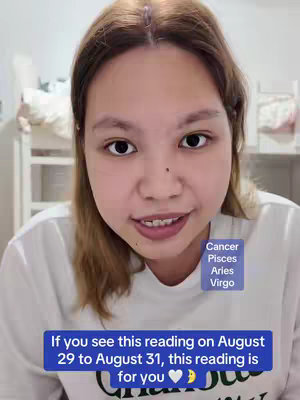 A young woman with fair skin and light brown hair is centered in the frame, smiling slightly and looking directly at the camera. She wears a white t-shirt. A blue rectangular overlay in the bottom contains the hook text. Above her head, to the right, a smaller transparent rectangle displays the zodiac signs Cancer, Pisces, Aries and Virgo.