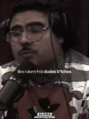The image features a man with glasses and a mustache in a red and black patterned shirt, holding a microphone. Text overlayed mentions not sleeping with girls who have boyfriends. The Alpha Motivation logo is present at the bottom.