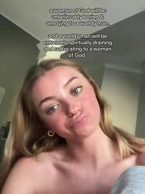 A selfie-style shot featuring a young woman with light-colored hair, turned slightly toward the camera. She has fair skin and a slightly pursed expression. Overlaid text is displayed on a transparent background.