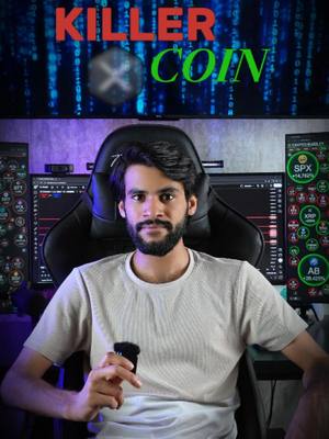 The cover image features a man sitting in front of multiple computer monitors. The background has a matrix-like digital rain pattern. The man, with a beard and short dark hair, is wearing a light-colored t-shirt and holding a small black device. Above him, the words 'KILLER COIN' are displayed in red and green. The overall composition focuses on a trading setup.