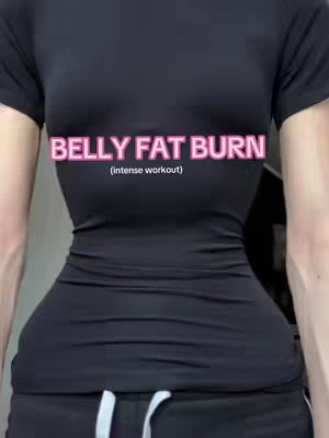 The cover image is a close-up shot of a person's torso and arms, dressed in a black, tight-fitting top and black shorts, posing to highlight their waist and midsection. The top has short sleeves, and the person is positioned against a plain light-colored background. Overlayed text in pink font says "BELLY FAT BURN" with "(intense workout)" below it.