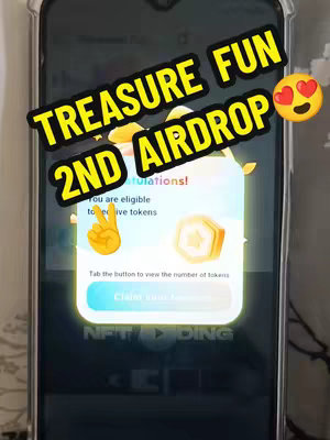 A screenshot of a mobile phone screen with a notification about an airdrop. The phone is held inside a clear case. The main elements are overlaid text blocks, a graphic of a hand, a token icon, and an outlined area with more text.