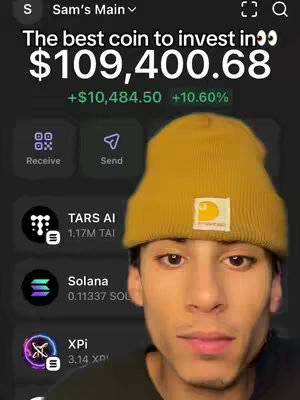 The cover image shows a young man wearing a yellow beanie, looking towards the camera. Behind him is a screen displaying a finance app interface with the user's total balance and the value of investments, as well as app buttons that appear to be for actions like sending and receiving crypto. The image has a modern, clean design, with a dark background.