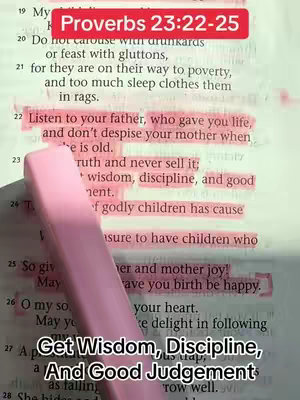 The image shows an open book with a Bible verse highlighted in pink. There is a pink highlighter diagonally across the page, and text overlays at the top and bottom of the image.
