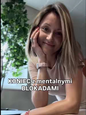 The cover image shows a woman in a light-colored top with blonde hair and a ring on her finger, resting her head on her hand. The background includes a blurred green plant. Text reading "KONIEC z mentalnymi BLOKADAMI" is overlaid at the bottom of the image.