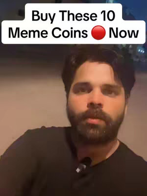 A close-up shot featuring a man in a black shirt as the main focus. Above him is a white rectangular frame with the text 'Buy These 10 Meme Coins Now' in bold, black letters. A red circle is placed after the phrase 'Meme Coins'. The background softly fades from a neutral beige color, providing minimal distraction.