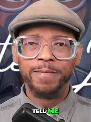 The cover image features a man with glasses and a hat, microphone in front of him, with a graphic overlaid on the bottom.
