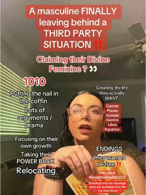 A woman with glasses is in the center of the image. She is holding a tarot card and talking. There is text overlayed on the image. The background appears to be a room.