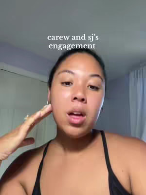 A woman with dark hair and a black top is looking at the camera. The hook "carew and sj's engagement" is overlaid on the top of the image.