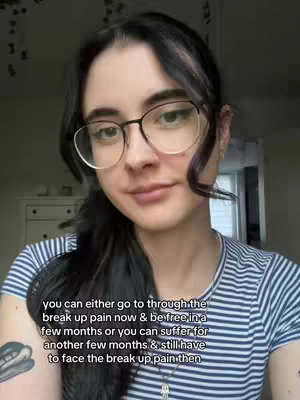A woman with dark hair and glasses is centered in the frame, smiling slightly. Behind her, a blurred background suggests an indoor setting, possibly a room in a house. The woman's upper body is visible, with a striped shirt. Text overlayed on the image offers advice.