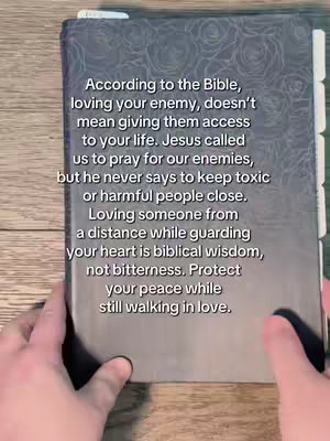 A vertical cover image shows a partially visible open Bible on a light-colored surface. The Bible's cover has a textured, grey design with darker accents. Text is overlaid on the Bible, providing the core message. The hands of the person holding the book are visible, holding it open. The overall composition is simple, with natural lighting.