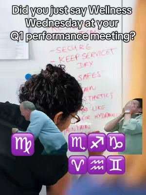 The cover image is a vertical video still. The main focus of the image is a person, seen from behind, with dark curly hair and eyeglasses, looking towards the right side of the frame. They are wearing a dark-colored top. The image has a partially visible whiteboard in the background with handwritten text in red and black marker. Several zodiac sign emoji symbols are in a horizontal row near the bottom. The text overlay at the top of the frame presents a conversational question.