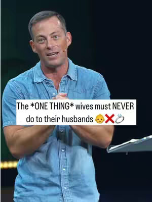 A man in a blue shirt stands in front of a dark background, speaking. Text overlayed on the image states a phrase about wives and husbands with related emojis.
