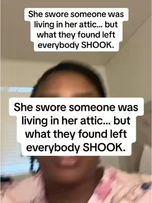 The cover image is a selfie-style shot featuring the top portion of a person's face. Two text boxes are overlaid, one above and one below her face, both containing similar text about a woman claiming someone living in her attic. The woman has dark hair near the top of the frame and is wearing what appears to be a light-colored, patterned collared shirt or top. The background seems to be an indoor setting with light-colored walls.