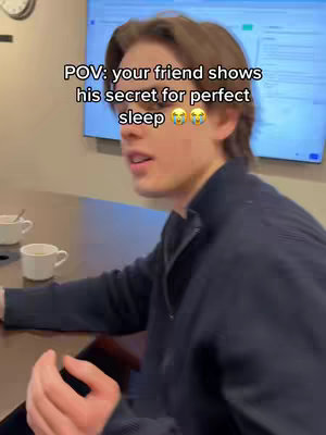The cover image shows a young man looking slightly to his left, appearing to speak. Overlayed text above the man reads 'POV: your friend shows his secret for perfect sleep' with crying emojis. The background includes furniture and a large screen.