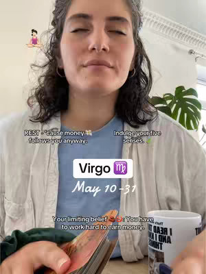 A woman with curly hair and closed eyes is centered in the frame. Overlay text includes a Virgo logo, the word 'Virgo', and text indicating a date range. She is wearing a light-colored shirt over what appears to be a blue top. In the bottom right, a mug is partially visible.