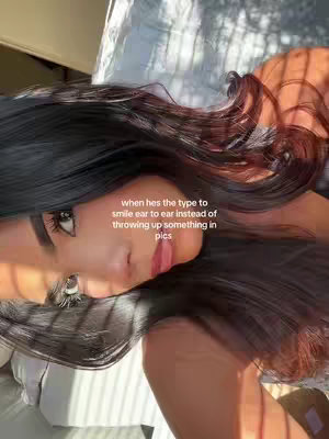 The cover photo shows the upper half of a person's face, with long, dark hair and a close-up view, with text overlayed.