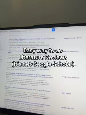 A computer screen is the primary focus, displaying a search results page. The screen is filled with numerous lines of text.  Added text in a stylized font overlays the screen, using white lettering against the brighter background; it reads, "Easy way to do Literature Reviews (it's not Google Scholar)". The overall composition is slightly angled, suggesting the image was captured from a user's perspective.