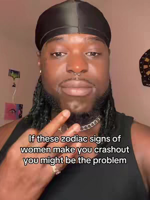 A selfie-style video cover image featuring a Black man with a durag, chains, and a finger touching his chin. Text overlays at the bottom.
