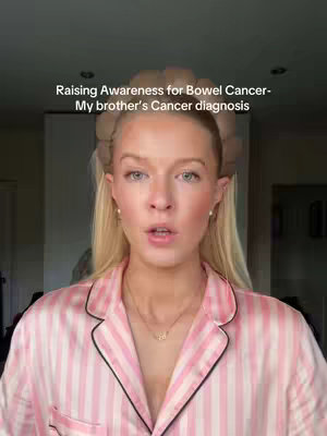 A woman with blonde hair and a headband is looking at the camera and talking. She is wearing a pink striped shirt with a dark trim around the collar and sleeves. Above her is text that reads 'Raising Awareness for Bowel Cancer - My brother's Cancer diagnosis'.