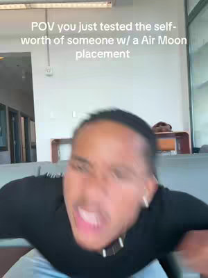A close-up shot with a blurred background. A person with hair pulled back, wearing a black top, is the main focus. The person's mouth is wide open in a yell, conveying high emotion and intensity. Text overlayed at the top: POV you just tested the self-worth of someone w/ a Air Moon placement