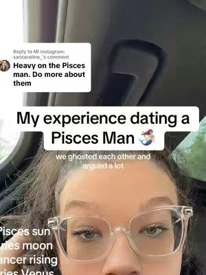 The image is a selfie with the creator's face taking up the lower half of the frame. She is wearing clear-framed glasses and has light-colored hair. Text overlays are present. The background is blurred, but appears to be inside a car.