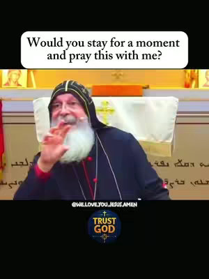 The cover image is a vertical video frame that features a religious figure, likely a bishop or a similar high-ranking cleric. The man, who appears to be of Middle Eastern descent, with a light skin tone and a white beard, is positioned at the center of the shot over a light-colored, wooden podium; the religious figure is wearing a black robe and a black hood with gold accents. The hook, at the top, poses a question about prayer, overlaid using a white rectangular shape. Below, a colorful logo sits above a light-colored wall with a decorative pattern.