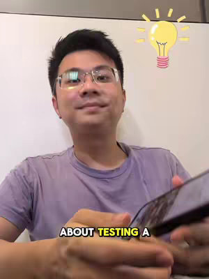 The cover image shows a man with glasses looking at the camera and holding a phone in his hands. There's a lightbulb graphic next to the man. The man is wearing a purple shirt.
