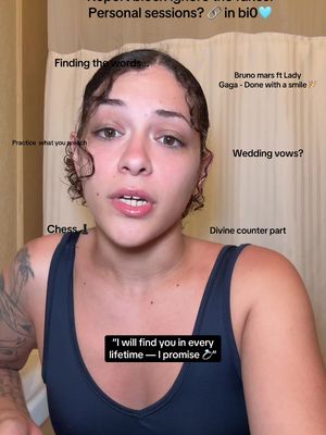 A selfie-style image with a woman centered, facing the camera, and speaking. She has curly hair. Text overlays are scattered around her head, along with text in a box at the bottom. The background appears to be a bathroom setting.
