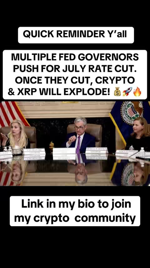 The image shows a split-screen view, with the top portion displaying text in a white box against a black background. The text reads "QUICK REMINDER Y'all" followed by "MULTIPLE FED GOVERNORS PUSH FOR JULY RATE CUT. ONCE THEY CUT, CRYPTO & XRP WILL EXPLODE!" with three stylized depictions: a money bag, a rocket ship, and flames. The bottom part of the image also on a black background, features a group of people at a table, presumably a meeting. They are facing the camera with serious expressions. Below the table is a mirrored reflection of the people at the table. At the bottom is another white box of text that reads: "Link in my bio to join my crypto community"