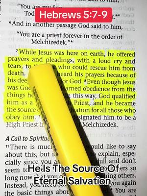 The image shows an open Bible with text highlighted in yellow and overlaid with the words "He Is The Source Of Eternal Salvation" in a modern font and a brightly colored highlighter pointing at the highlighted text. A red rectangular label at the top of the image shows the text "Hebrews 5:7-9". The image is shot from a slightly angled perspective, emphasizing the depth of the pages and the highlighter.