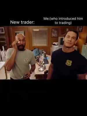 The image shows two men in an office setting. One man is wiping his eye, appearing distressed, while the other, wearing a black shirt with a badge, looks on with a slight smirk. Text overlays label them as 'New trader' and 'Me: (who introduced him to trading)'. The background includes office furniture and a window with blinds.
