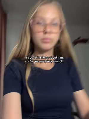 A young woman with blonde hair and glasses is the focus of a cover image, the foreground being slightly blurred. The image is framed from the chest up with a soft focus that creates a sense of intimacy. She is centered in the frame, wearing a dark blue shirt. A text overlay indicates a study-focused caption.