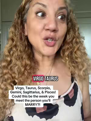 A woman with curly blonde hair is looking at the camera and speaking, with text overlays in the image. The overlay text includes 'VIRGO TAURUS' in a pink box.