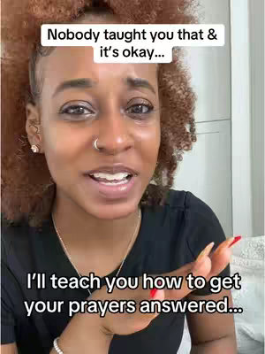 A woman with curly brown hair and a nose ring is speaking directly to the camera. She is wearing a black shirt and a necklace. The top of the frame has white text on a white background, and the bottom part has white text on a black background.