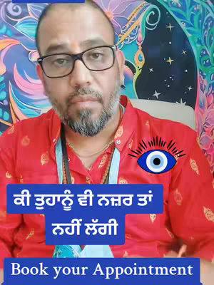 A man with a beard and glasses faces the camera wearing a red shirt, with text overlays in Punjabi and English.